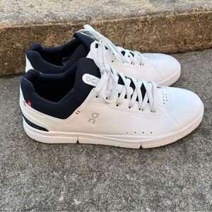 On Running White and Blue Sneakers Minimalist Design